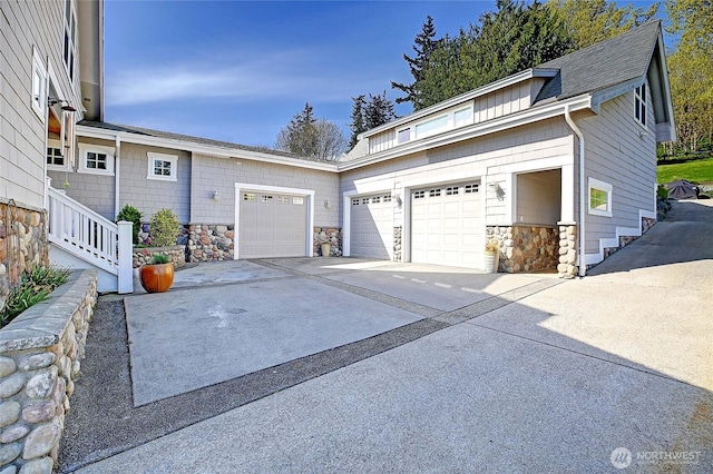 exterior space featuring concrete driveway