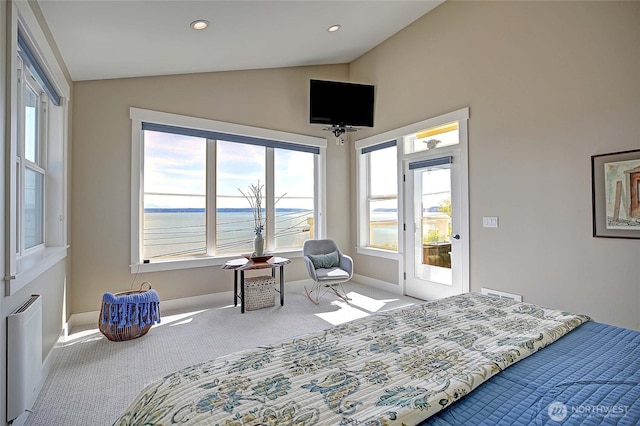 carpeted bedroom with lofted ceiling, radiator heating unit, baseboards, and recessed lighting