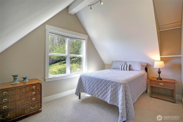 bedroom featuring vaulted ceiling with beams, baseboards, and carpet