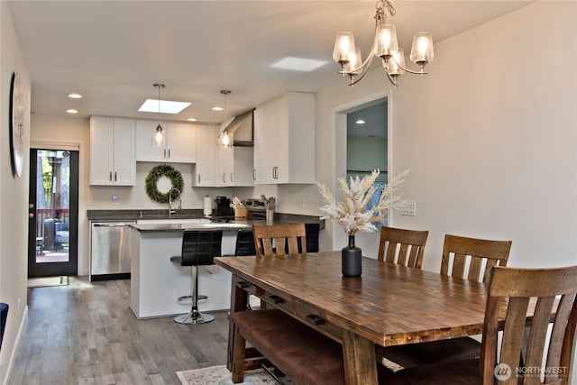 21221 SE 271st Pl, Maple Valley, WA 98038 - dining area with a chandelier, wood finished floors, and recessed lighting