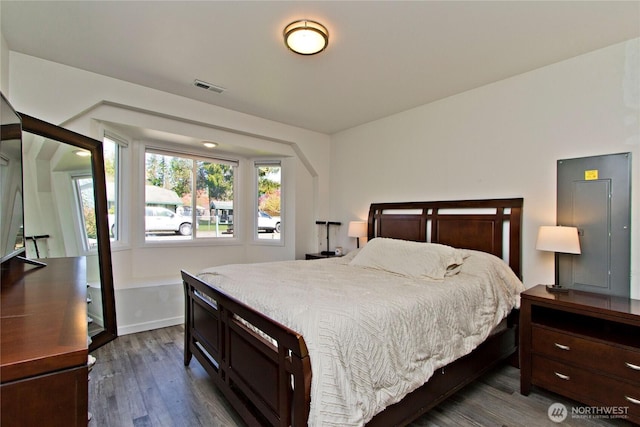 21221 SE 271st Pl, Maple Valley, WA 98038 - bedroom with dark wood-type flooring, visible vents, and baseboards