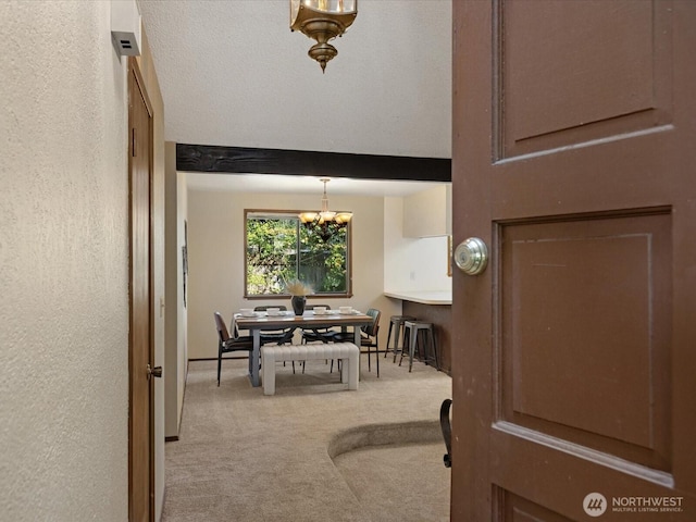 8142 NE 145th Pl, Kenmore, WA 98028 - dining room featuring carpet floors and a notable chandelier