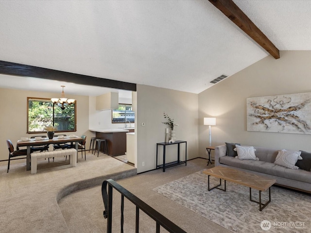 8142 NE 145th Pl, Kenmore, WA 98028 - living area featuring lofted ceiling with beams, visible vents, a notable chandelier, and light colored carpet