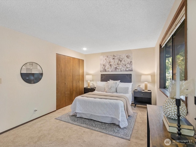 8142 NE 145th Pl, Kenmore, WA 98028 - bedroom with carpet, a textured ceiling, and a closet