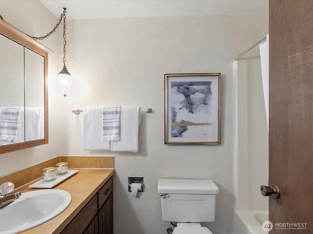 8142 NE 145th Pl, Kenmore, WA 98028 - bathroom featuring shower / bath combination, vanity, and toilet