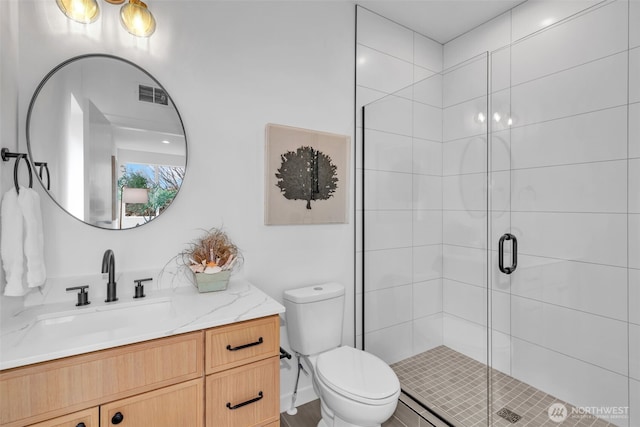 431 19th Ave E, Seattle, WA 98112 - bathroom with a stall shower, toilet, and vanity