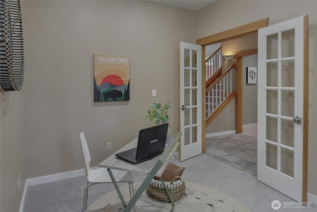 office with carpet floors, baseboards, and french doors