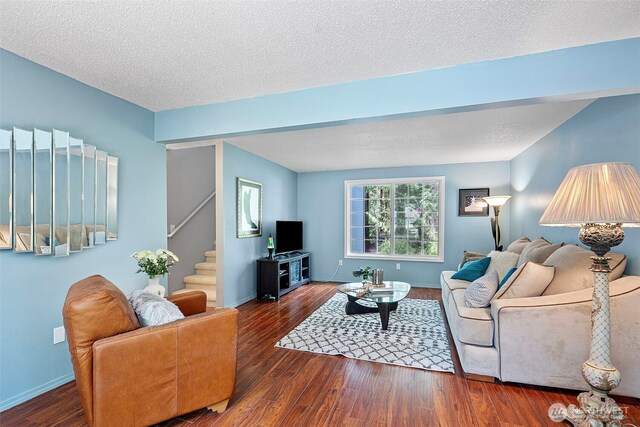 2336 Killarney Ct NW, Olympia, WA 98502 - living room featuring baseboards, stairs, a textured ceiling, and wood finished floors