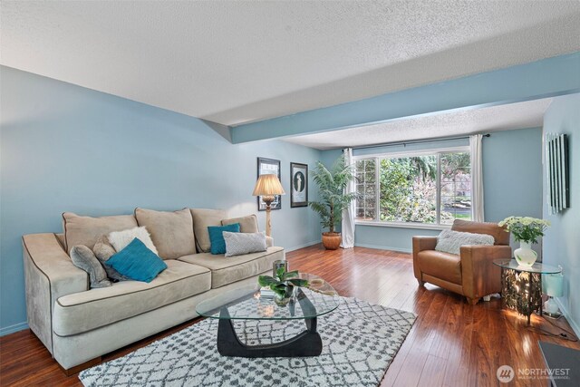 2336 Killarney Ct NW, Olympia, WA 98502 - living room featuring a textured ceiling and baseboards