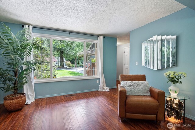 2336 Killarney Ct NW, Olympia, WA 98502 - sitting room with a textured ceiling, visible vents, wood finished floors, and baseboards