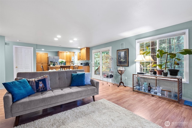 2336 Killarney Ct NW, Olympia, WA 98502 - living room with light wood-type flooring, visible vents, baseboards, and recessed lighting