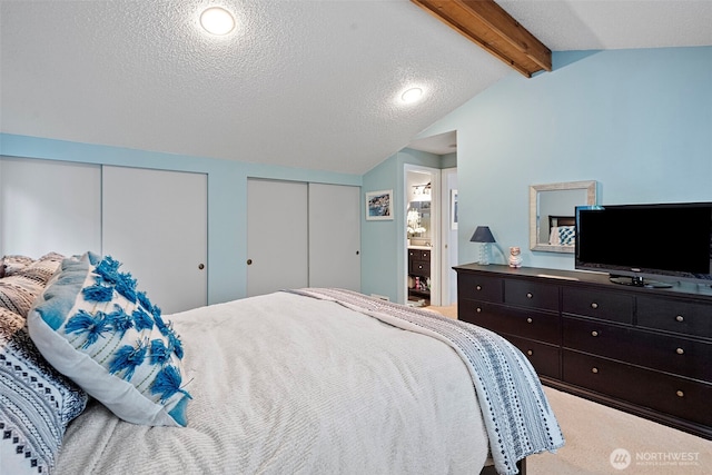 2336 Killarney Ct NW, Olympia, WA 98502 - bedroom featuring two closets, a textured ceiling, recessed lighting, and vaulted ceiling with beams