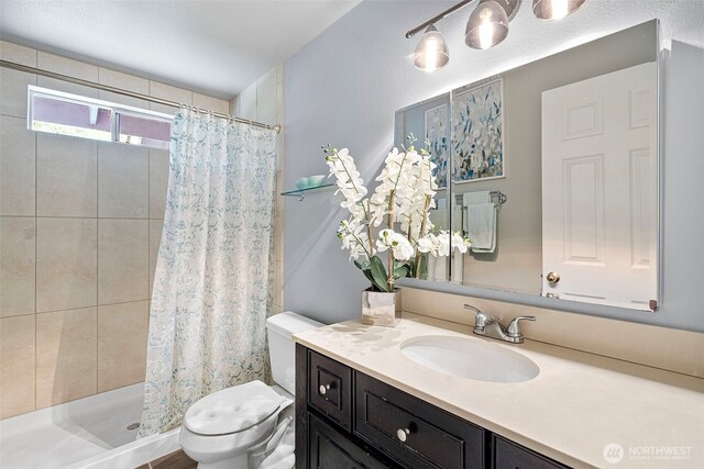 2336 Killarney Ct NW, Olympia, WA 98502 - bathroom with toilet, vanity, and a shower stall
