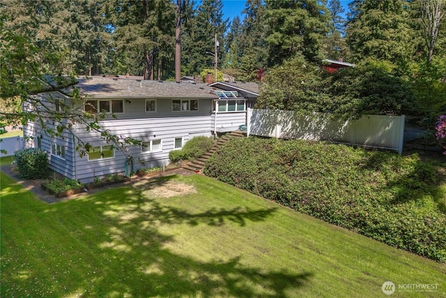 2139 SW 316th St, Federal Way, WA 98023 - rear view of house with stairs, fence, and a yard