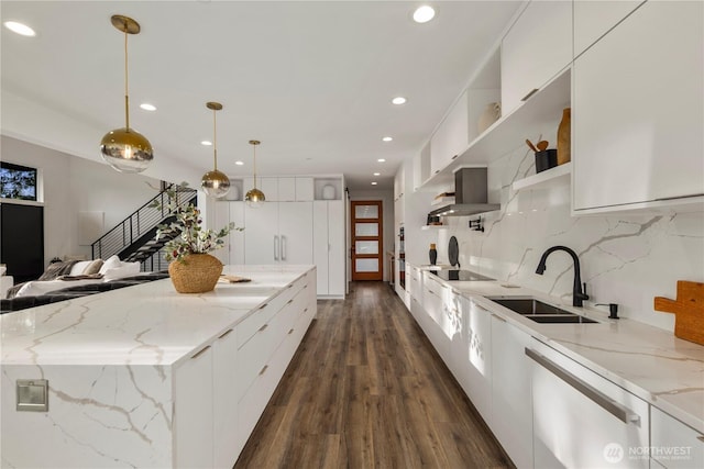 kitchen featuring dark wood-style flooring, a sink, modern cabinets, and white cabinets