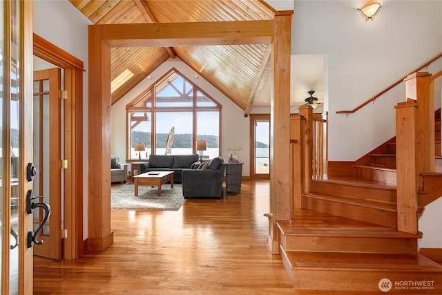 3193 Northshore Rd, Bellingham, WA 98226 - interior space with lofted ceiling with beams, light wood-style floors, stairs, a ceiling fan, and wood ceiling