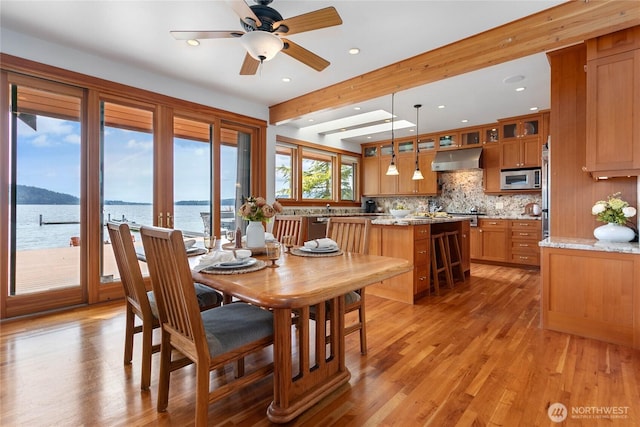 3193 Northshore Rd, Bellingham, WA 98226 - dining space with light wood-type flooring, recessed lighting, a water view, and ceiling fan