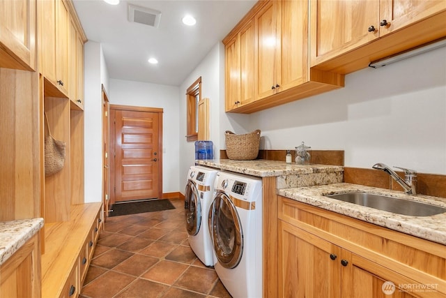 3193 Northshore Rd, Bellingham, WA 98226 - clothes washing area with visible vents, washer and dryer, recessed lighting, a sink, and cabinet space