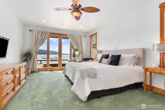 3193 Northshore Rd, Bellingham, WA 98226 - bedroom with light colored carpet, access to exterior, a ceiling fan, recessed lighting, and a water view