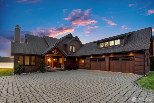 3193 Northshore Rd, Bellingham, WA 98226 - view of front of home with roof with shingles, a chimney, and decorative driveway