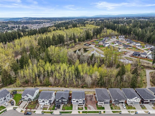 18619 128th St E, Bonney Lake, WA 98391 - aerial view of property and surrounding area with nearby suburban area and a forest