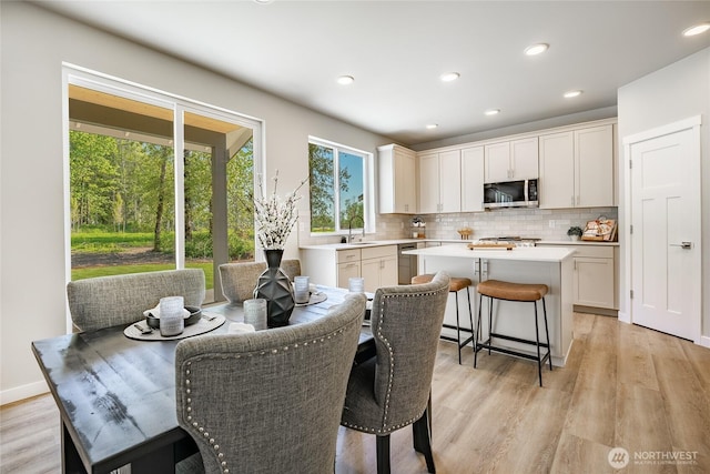 3009 Oleander Ln, Blaine, WA 98230 - dining room featuring recessed lighting and light wood-style flooring