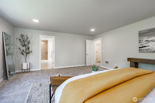 3009 Oleander Ln, Blaine, WA 98230 - carpeted bedroom with baseboards, recessed lighting, ensuite bath, and visible vents