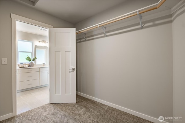 3009 Oleander Ln, Blaine, WA 98230 - walk in closet featuring light colored carpet and visible vents
