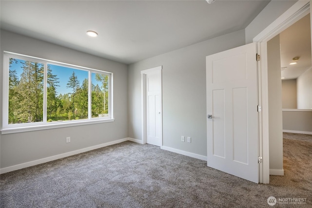 3009 Oleander Ln, Blaine, WA 98230 - unfurnished bedroom with baseboards and carpet flooring