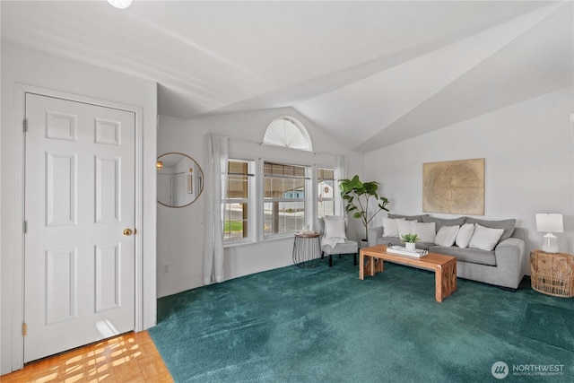 unfurnished living room with lofted ceiling