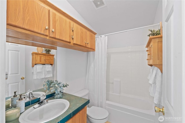 full bath with shower / bathtub combination with curtain, vanity, vaulted ceiling, visible vents, and toilet