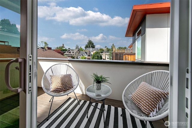 balcony featuring a residential view