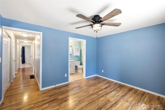 2607 SE 138th Loop, Vancouver, WA 98683 - unfurnished bedroom featuring wood finished floors and ensuite bath