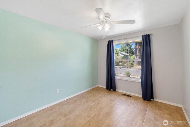 2607 SE 138th Loop, Vancouver, WA 98683 - spare room featuring light wood finished floors and a ceiling fan