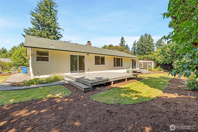 2607 SE 138th Loop, Vancouver, WA 98683 - rear view of house with a chimney and a deck