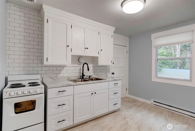 kitchen with baseboard heating, light countertops, white cabinetry, white range with electric stovetop, and a sink