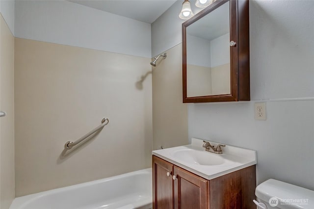 bathroom with vanity and toilet