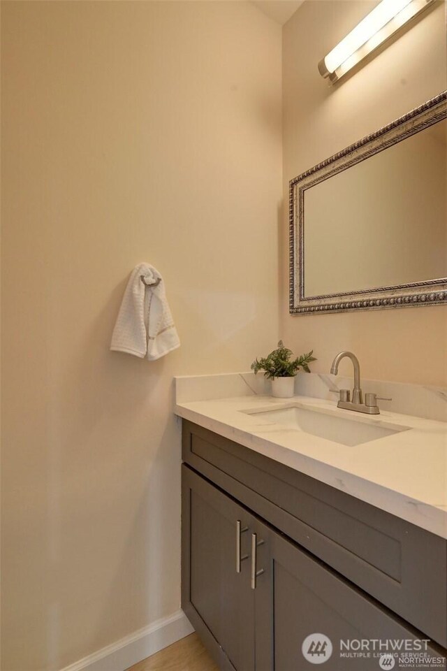 12446 NE 7th Pl, Bellevue, WA 98005 - bathroom with vanity and baseboards