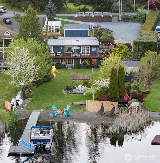 view of subject property featuring a nearby body of water