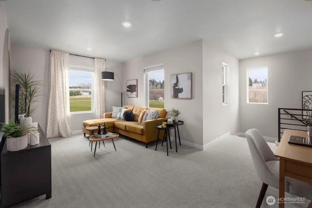 living room featuring recessed lighting, carpet flooring, and baseboards