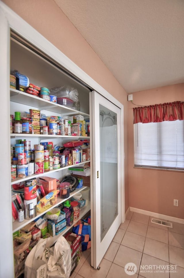 storage area featuring visible vents