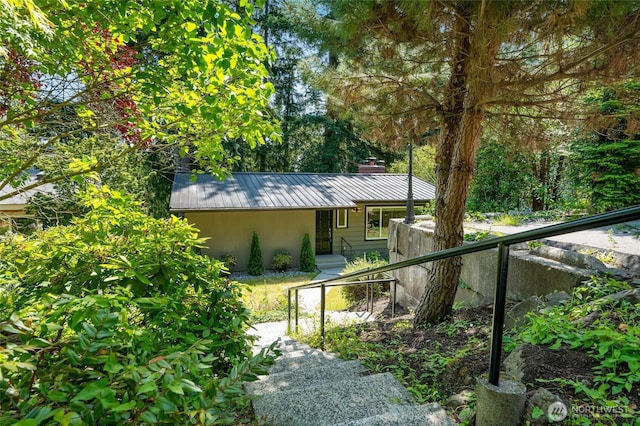 19010 12th Ave NE, Shoreline, WA 98155 - view of side of home with a metal roof