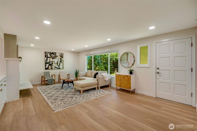 19010 12th Ave NE, Shoreline, WA 98155 - living room with light wood-style floors and recessed lighting