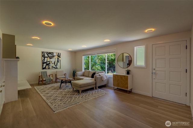 19010 12th Ave NE, Shoreline, WA 98155 - living area featuring wood finished floors and recessed lighting