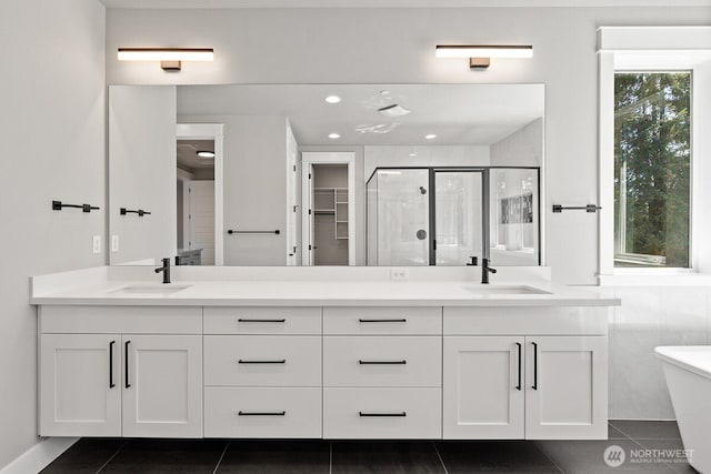 1436 238th St SE, Bothell, WA 98021 - bathroom featuring a sink, tile patterned flooring, a shower stall, and double vanity