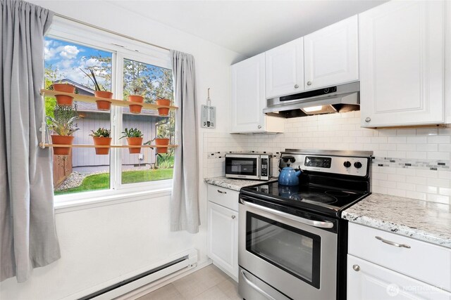 kitchen with decorative backsplash, white cabinetry, a baseboard heating unit, under cabinet range hood, and stainless steel appliances