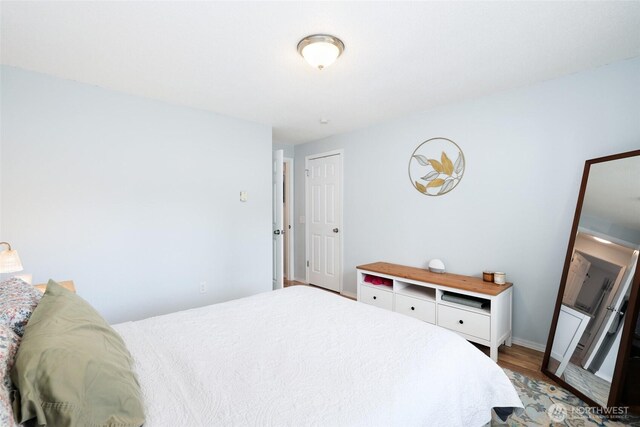 bedroom featuring wood finished floors