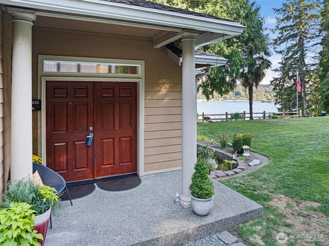 14407 Goodrich Dr NW, Gig Harbor, WA 98329 - property entrance featuring a water view and a yard