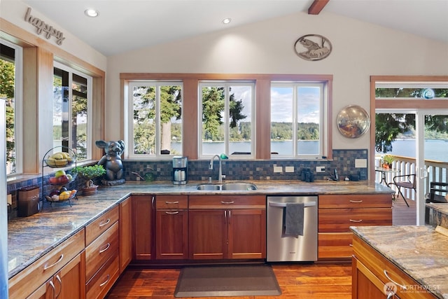 14407 Goodrich Dr NW, Gig Harbor, WA 98329 - kitchen with dishwasher, a sink, dark wood-style flooring, light stone countertops, and vaulted ceiling with beams