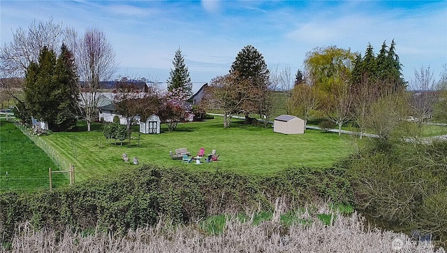 view of yard with a shed and an outdoor structure